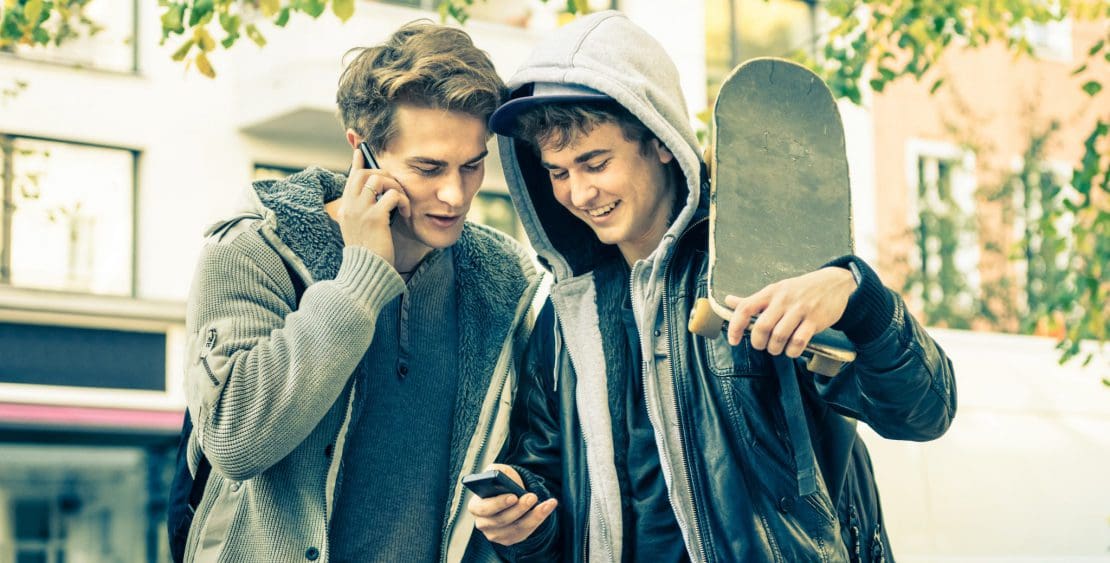 Two young men with skateboard
