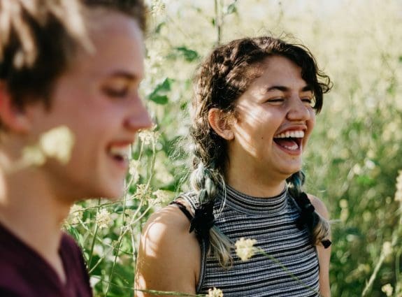 Happy girls in meadow